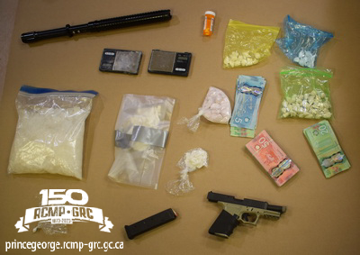 Photo of the cash, drugs seized by police