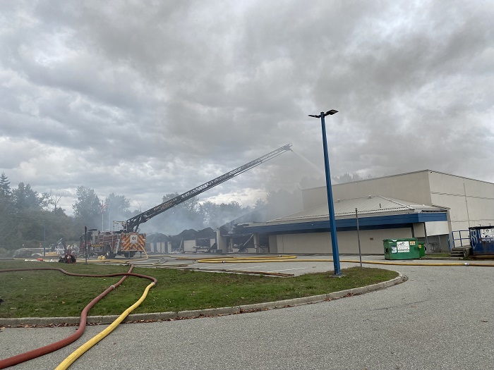 Port Coquitlam Fire continue to extinguish the fire at the school